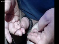 Extremely bizarre homemade movie of a guy with small cock inserting worms into his dick hole